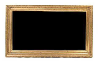 A Victorian Giltwood Frame, LATE 19TH CENTURY, Height 61 1/8 x width 37 inches.
