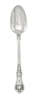 A Victorian Silver Serving Spoon, George William Adams, London, 1864, with a shell and foliate decorated handle.