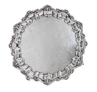 * An Edwardian Silver Salver, Baker Brothers, Birmingham, 1901, in Georgian style, shaped circular with shell and scroll rim, ra