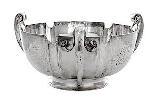 * An Edwardian Silver Center Bowl, Elkington & Co., London, 1905, having three scroll handles.