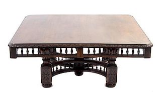 * An American Oak Extension Table, LATE 19TH CENTURY, Height 20 x width 49 x depth 47 1/2 inches.