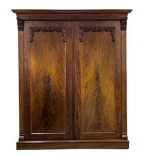 * A Victorian Mahogany Armoire, Height 84 1/2 x width 69 3/4 x depth 26 1/2 inches.