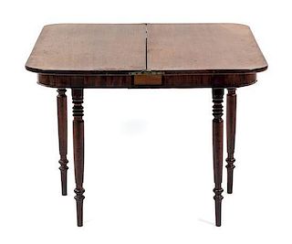 * An American Victorian Mahogany Flip-Top Tea Table, LATE 19TH CENTURY, Height 27 3/4 x width 35 1/4 x depth 35 1/4 inches.