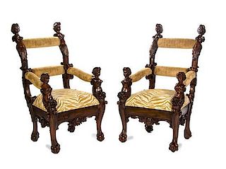 * A Pair of Renaissance Revival Carved Mahogany Open Armchairs, Height 55 inches.