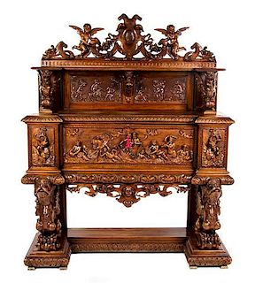 * A Renaissance Revival Carved Oak Console Cabinet, ATTRIBUTED TO R.J. HORNER, Height 77 x width 62 x depth 26 inches.