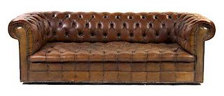 A Victorian Style Leather Upholstered Chesterfield Sofa, Width 86 inches.