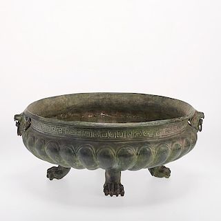 Greco-Roman style bronze footed jardiniere