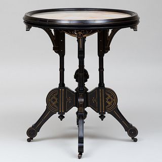 American Aesthetic Movement Ebonized and Parcel-Gilt Center Table with Onyx Top