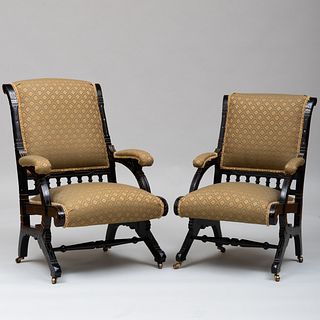Two American Aesthetic Movement Ebonized, Parcel-Gilt and Upholstered Parlor Chairs