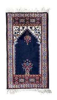 * A Persian Wool Prayer Rug 4 feet 2 inches x 2 feet 8 inches.