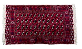 * A Russian Bokhara Wool Rug 8 feet 4 inches x 5 feet 1 inch.