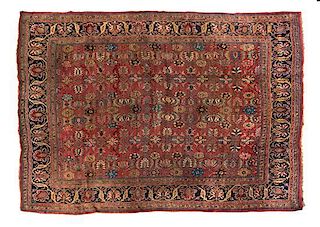 * A Persian Wool Rug 12 feet 7 inches x 11 feet 2 inches.