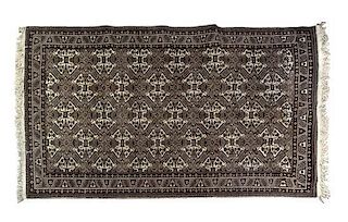A Bokhara Wool Rug 9 feet 7 inches x 6 feet 6 inches.