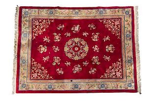 * A Chinese Wool Rug 10 feet 2 inches x 7 feet 2 inches.