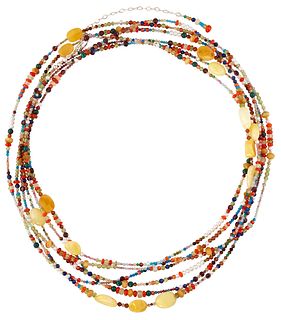 AN IMPRESSIVE GEMSTONE BEAD NECKLACE, oval amber beads spac