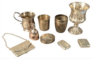 Sterling Silver Lot to include, Georg Jensen bell, W. Adams N.Y. mug, small purse, match safe, and stemmed mug, 23 t.oz. Provenance: The Estate of Ali