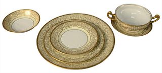 Approximately 181 Piece Dinnerware Set of Hutschenreuther and Heinrich & Company, in white and cream with gilt foliate design to the edge, to include 