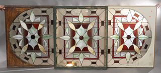 Set of Three Stained Glass Windows to include, a pair along with an arch shaped window, 37" x 43 1/2" and 35" x 43".