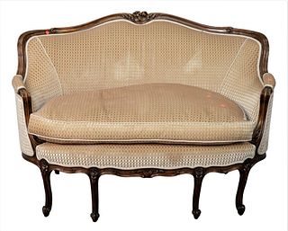 Victorian Walnut Settee, having carved frame and new upholstery, height 35 inches, width 53 inches.