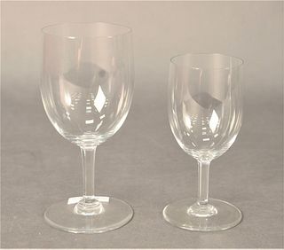 Set of Sixteen Baccarat Crystal Stems, to include a set of eight red wines, along with a set of eight white wines, height 5 3/4 inches and 6 3/4 inche