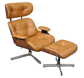 Eames Style Brown Leather Lounge Chair, along with matching ottoman, height 38 1/2 inches.