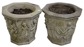 Pair of Nina Studio Outdoor Planters, each in octagonal form, having raised angle decorations, height 19 1/2 inches, diameter 22 inches.