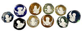 Ten Baccarat Glass Paperweights, having sulfide busts, to include the Liberty Bell, Abraham Lincoln, two Andrew Jackson, along with Queen Elizabeth I.