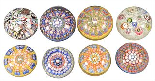 Eight Perthshire Millefiori Glass Paperweights, two dated 1969 and 1970, each with a label adhered to the underside, diameter 2 7/8 inches. Provenance