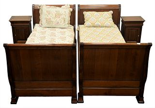 Four Piece Lot, to include a pair of twin sized mahogany sleigh trundle beds along with two matching nightstands having one drawer over one door, bed 