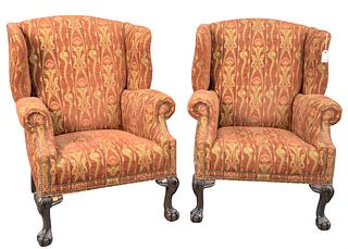 Pair of Hancock and Moore Upholstered Wing Chairs, having ball and claw feet, height 41 inches, width 33 inches.