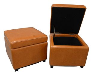 Pair of Brown Leather Ottomans, having lift top opening to storage, height 15 1/2 inches, width 18 inches, depth 17 1/2 inches.