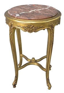 Louis XV Style Giltwood Occasional Table, having round rouge marble top over x-stretcher base, height 28 inches, diameter 21 inches.