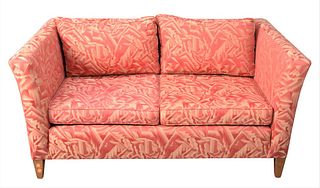 Pair of Ehrlich's Loveseats, in matching Brunschwig and Fils red upholstery, height 28 inches, length 57 1/2 inches, depth 34 inches.