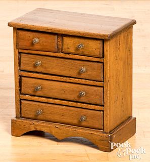 Miniature pine and butternut chest of drawers