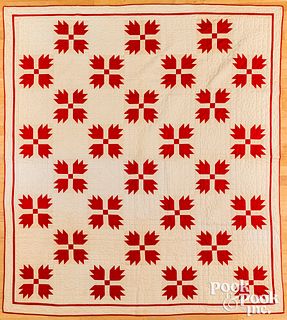 Two red and white bear track quilts, early 20th c.