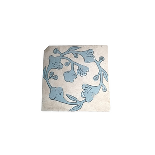 Blue and white flowers on a sand color bakcground. 13 pieces. They can be purchased in groups of ten. 