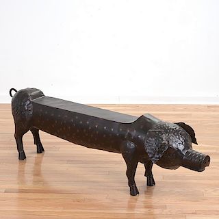 Decorator patinated metal pig bench
