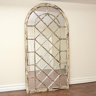 Architectural salvage window mounted as a mirror