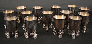 SET OF FOURTEEN SILVER PLATED ELEPHANT FOOTED CUPS