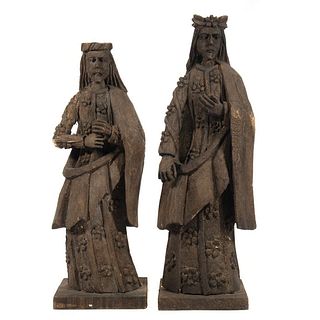Pair of Colonial Style Carved Figures