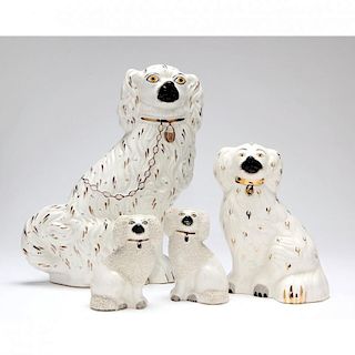 Four Staffordshire Porcelain Dogs