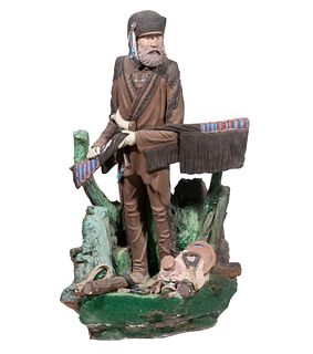 LARGE 1950S PAINTED PLASTER SCULPTURE OF AN AMERICAN FRONTIERSMAN