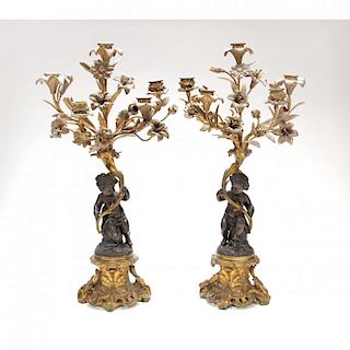 Pair of Continental Bronze Figural Candelabra