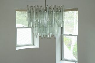 OVAL FORM TIERED PRISM CHANDELIER