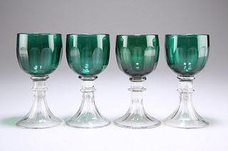A SET OF FOUR EARLY 19TH CENTURY BRISTOL GREEN GLASS WINES,