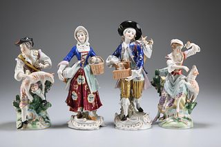 TWO PAIRS OF CONTINENTAL PORCELAIN FIGURES, CIRCA 1900, eac