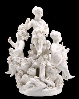 A MENNECY WHITE-GLAZED PORCELAIN FIGURE GROUP, CIRCA 1760, 