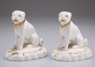 A PAIR OF DERBY GILT AND WHITE PORCELAIN MODELS OF PUG DOGS