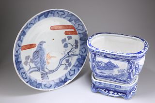 A JAPANESE IMARI CHARGER, blue painted with an eagle perche