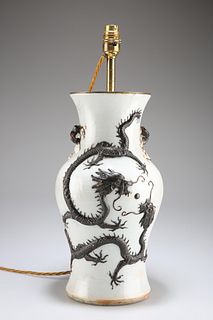 A CHINESE PORCELAIN TABLE LAMP, vasiform, moulded in relief